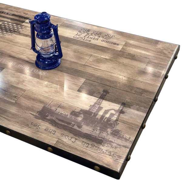Tin Cup Kitchen + Oyster Bar - Customer Supplied Artwork Digitally Printed Table Top with a Black Powdercoat Metal Edge and Decorative Nails.